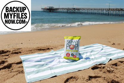 SkinnyPop gluten-free sea salt microwave popcorn snack multipack, 12 individual 2.8 oz bags, ready for snacking.