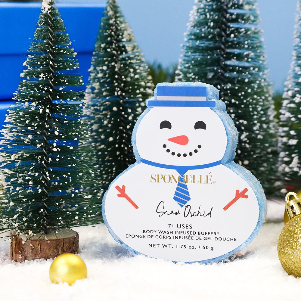 Snow Orchid Holiday Snowman body wash infused buffer by Spongellé with snowflake design and floral scent, ideal for luxurious skincare.