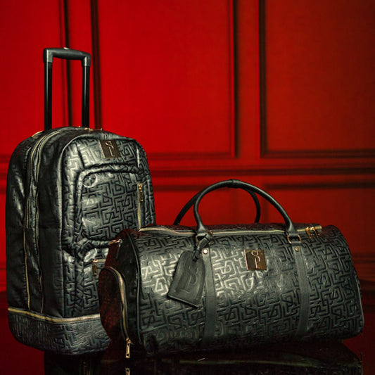 Sole Premise monogram leather roller bag set with signature roller and duffle, featuring sleek design and durable leather construction.