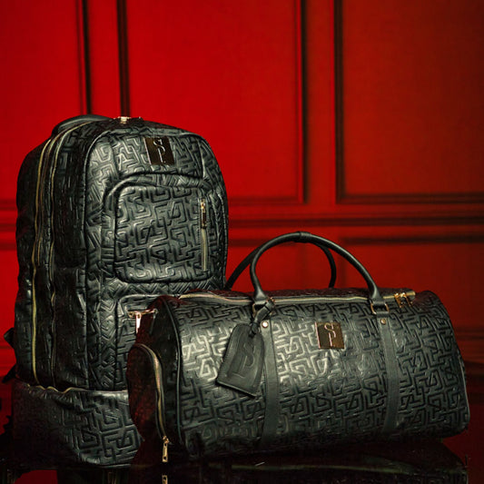 Sole Premise Monogram Leather Signature Bag Set including a signature tote and duffle bag with monogram design.