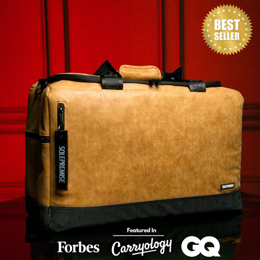 Brown leather sneaker duffle bag by Sole Premise, stylish sports bag with leather finish and spacious interior for travel or gym use.