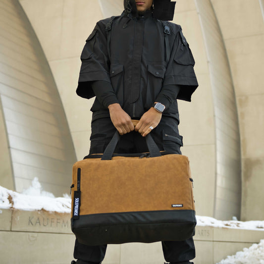 Brown leather sneaker duffle bag from Sole Premise, stylish sports bag with durable leather and spacious interior.