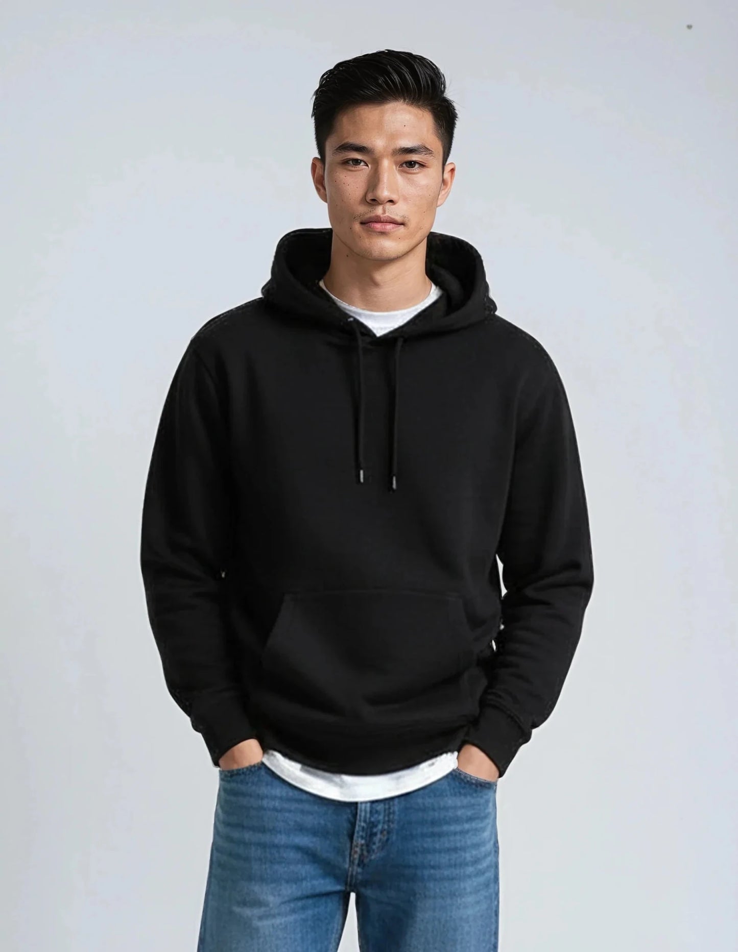 Black fleece heavyweight hoodie from SpectraUSA, shows a cozy, thick fabric hoodie with a front pocket and hood.