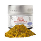 Spicy Thai seasoning from Gustus Vitae, gourmet blend with red chili and herbs, in a clear jar.