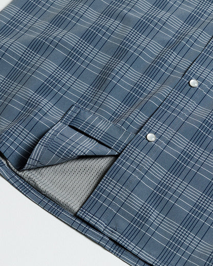 Short sleeve Deke SS Shirt in Dusty Royal by Off The Grid Surplus, featuring a button-up design in blue fabric.