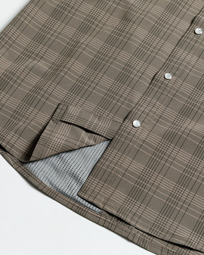 Off The Grid Surplus Deke SS Shirt in Beluga Brown, short sleeve button-up shirt with a green background and front pocket detail.