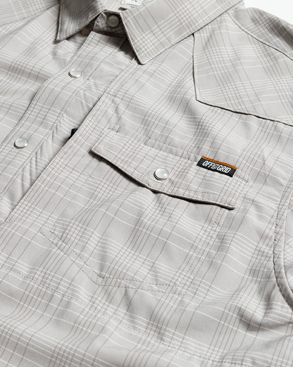 Storm grey Deke SS Shirt by Off The Grid Surplus, short sleeve button-up shirt shown on a hanger.