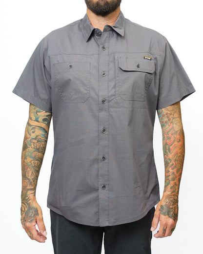 Off The Grid Surplus Thunderbolt SS Shirt in castlerock grey, short sleeve button-up with solid color design.