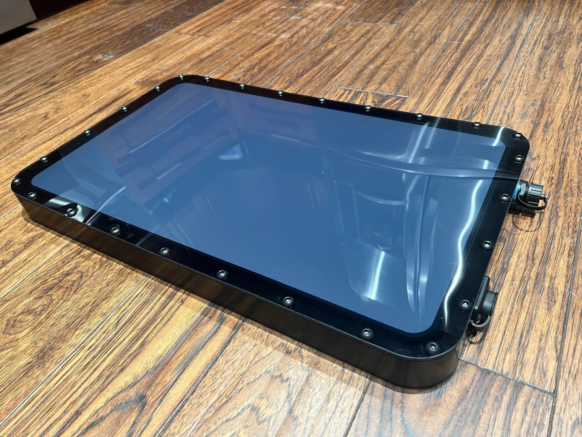 Black Star Mount Systems all-in-one 12V flat mount for Gen 2 Starlink, shown with clear lid and mounting hardware.