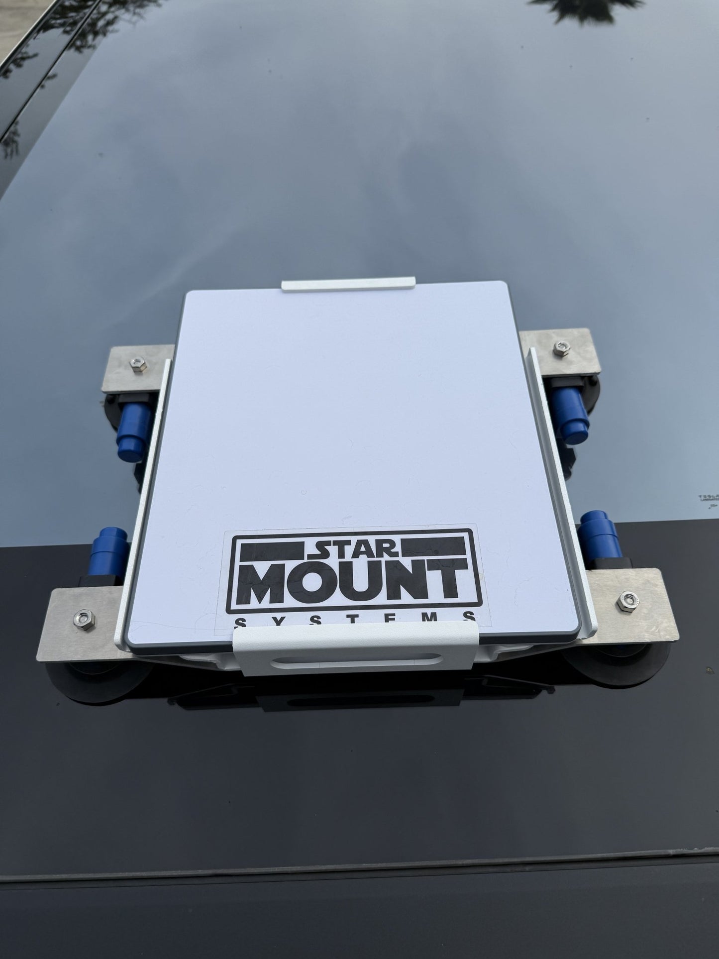 Black Star-Mount MINI Explorer PRO mount by Star Mount Systems, designed for secure attachment of cameras or equipment.