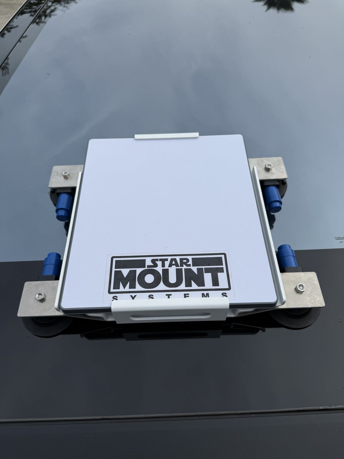 Black Star-Mount MINI Explorer PRO mount by Star Mount Systems, designed for secure attachment of cameras or equipment.
