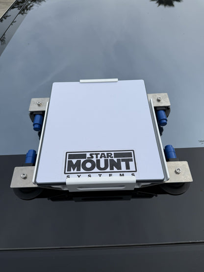 Black Star-Mount MINI Explorer PRO mount by Star Mount Systems, designed for secure attachment of cameras or equipment.