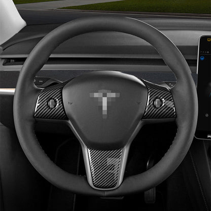 Tesla Model 3 and Y steering wheel cover patch by Tesery, showing a close-up of the textured black steering wheel cover.