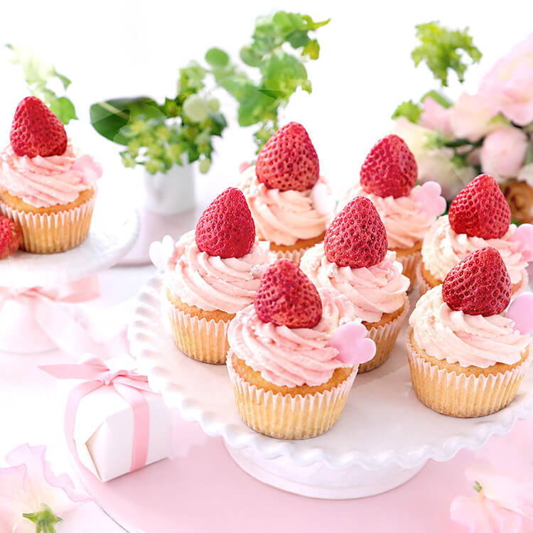 Freeze-dried whole strawberries from VFD.US, ideal for baking, shown in a cup for use in desserts and recipes.
