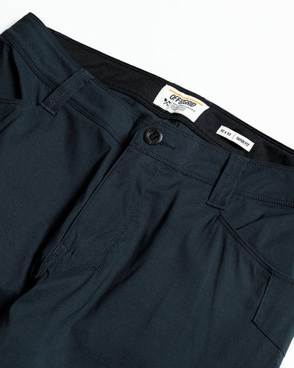 Off The Grid Surplus Lancer Taper Fit Pant in Vulcan Navy, showing the navy stretch pants with tapered design and waistband detail.