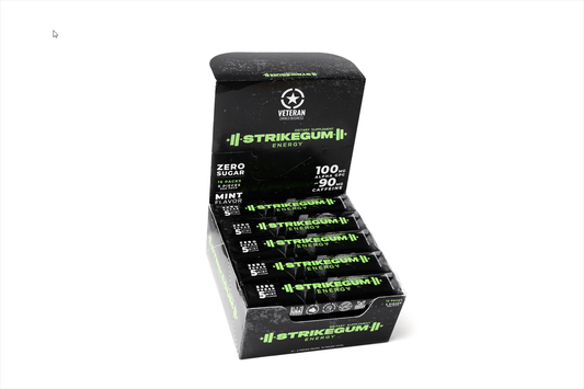 StrikeGum Strike Premium Energy Gum tray with multiple pieces, featuring sleek packaging and vibrant branding.