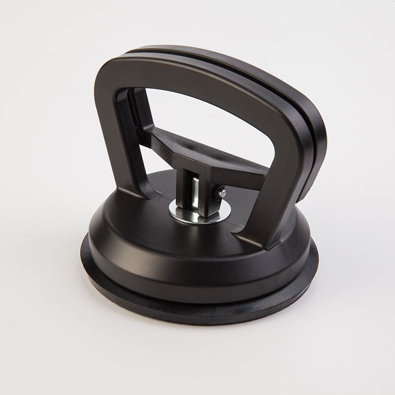 Tesla car dent repair kit with suction cup puller in two sizes and three colors, paint-safe for DIY dent removal.