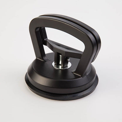 Tesla car dent repair kit with suction cup puller in two sizes and three colors, paint-safe for DIY dent removal.