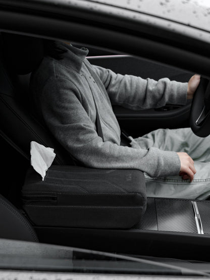 Suede armrest cover with raised pad and tissue box for Tesla Model Y Juniper and Model 3 Highland, by Tesery Official.