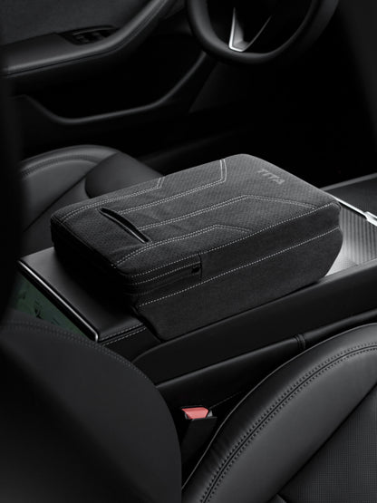 Suede armrest cover with raised pad and tissue box for Tesla Model Y Juniper and Model 3 Highland, providing comfort and protection.