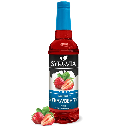 Bottle of Syruvia sugar-free strawberry syrup with a clear label and fresh strawberries around on a white background.