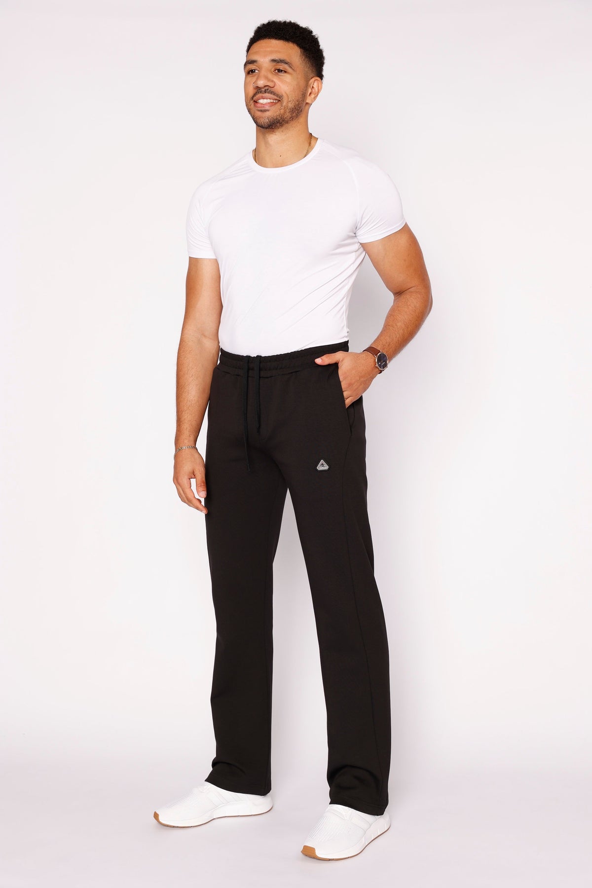 Black SCR Sportswear SCR Classic Athleisure Sweatpants with zipper pockets for men, straight fit, tall size, made of cotton.