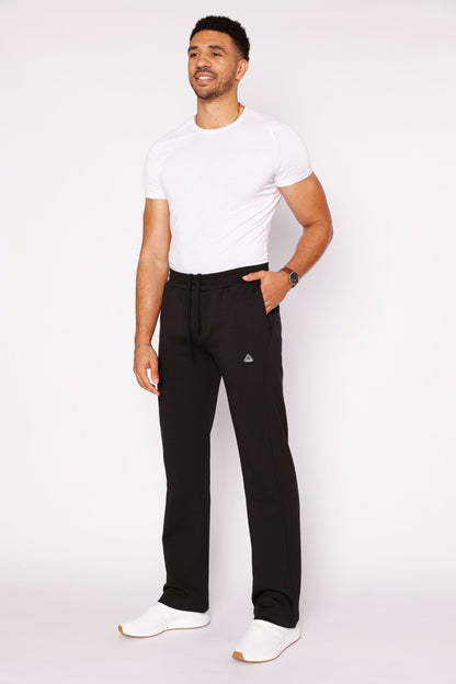 Black SCR Sportswear SCR Classic Athleisure Sweatpants with zipper pockets for men, straight fit, tall size, made of cotton.
