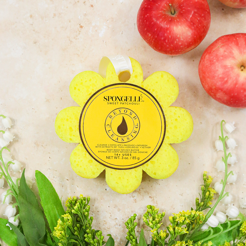 Spongellé Sweet Patchouli Wild Flower body wash infused buffer with floral and patchouli scent, showing the textured buffer pad.