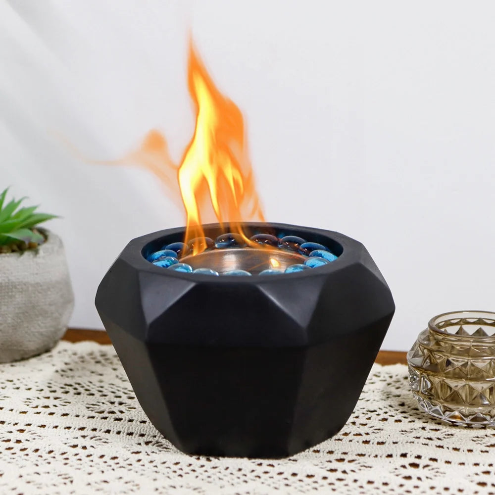 Portable 6x4-inch cement tabletop fireplace by JHY DESIGN featuring gel and ethanol fire burning in a modern fire bowl.