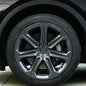Set of four Tesery 19" Mister ABS wheel covers for Tesla Model Y in two colors, featuring aerodynamic design and quality craftsmanship.