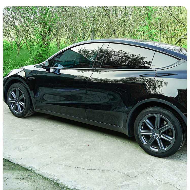 Set of four Tesery 19-inch Mister ABS wheel covers for Tesla Model Y, aerodynamic design, available in two colors, stylish and durable.