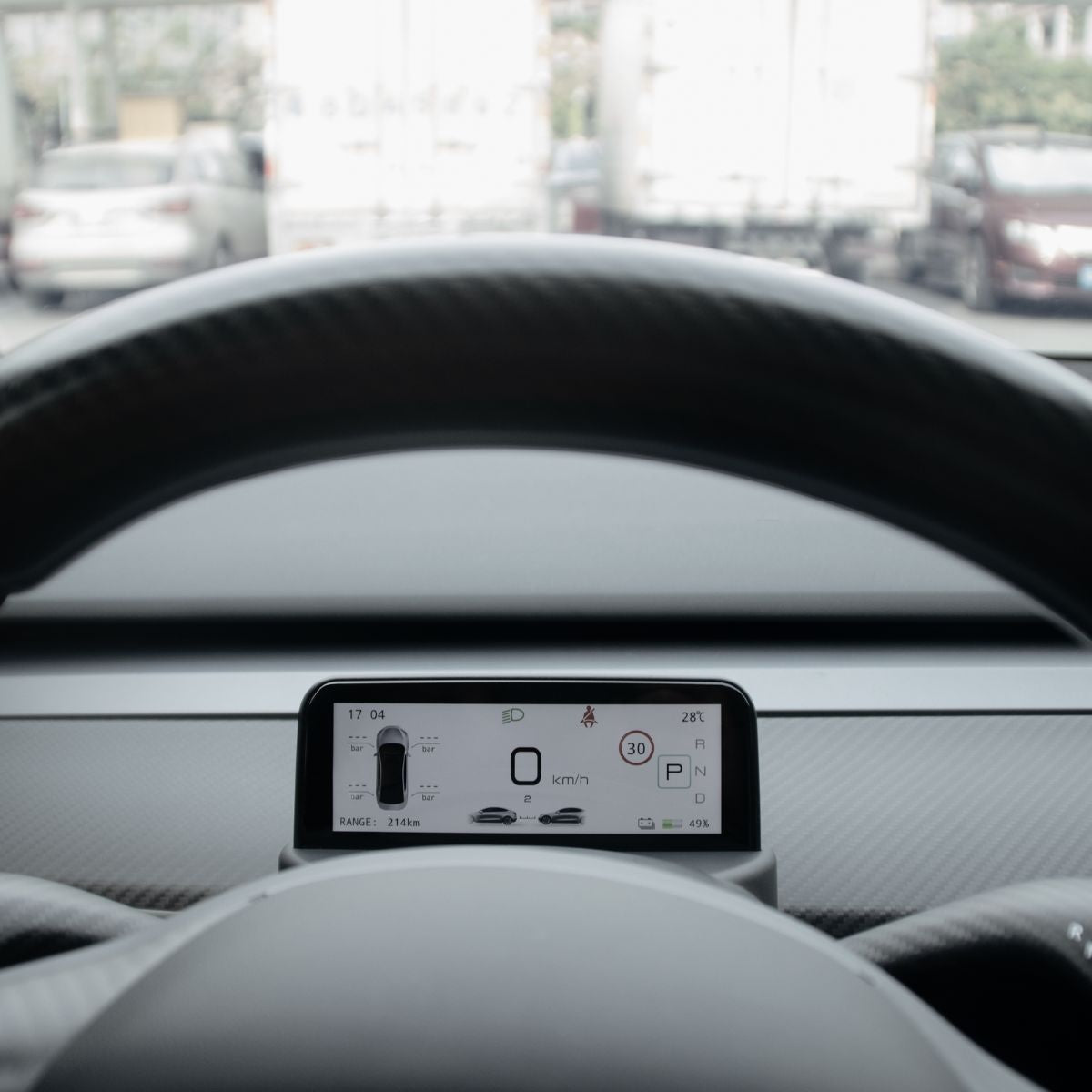 Tesla Model 3/Y TESERY 4.6-inch mini dashboard display screen showing navigation and controls in a clean car interior.