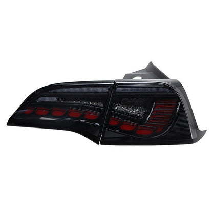 Tesla Model 3/Y Dragon Scale Tail Lights by Tesery, featuring unique scale design and bright LED illumination.