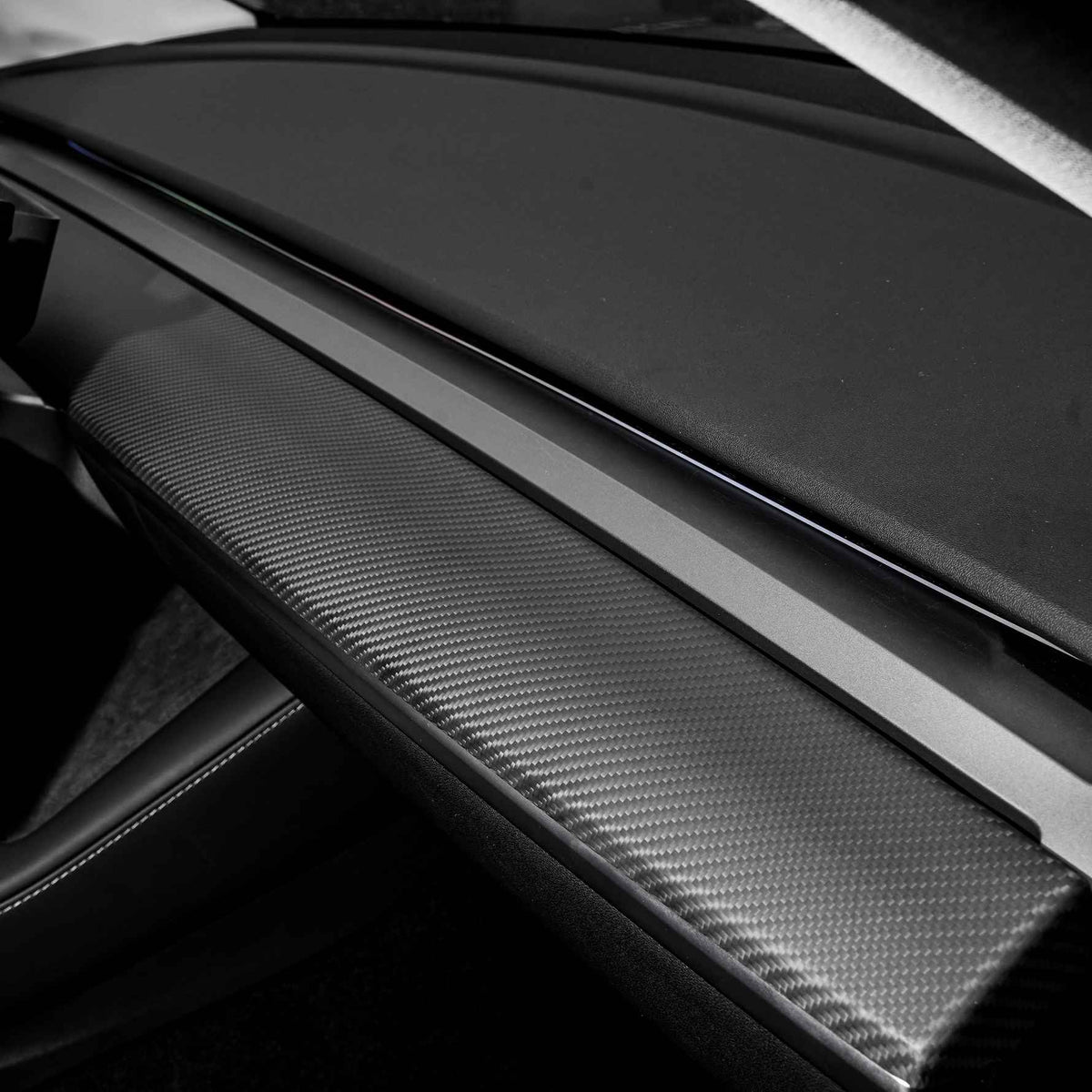 Tesla Model 3/Y dashboard cover in dry carbon fiber with sleek interior mod design, by TESERY.