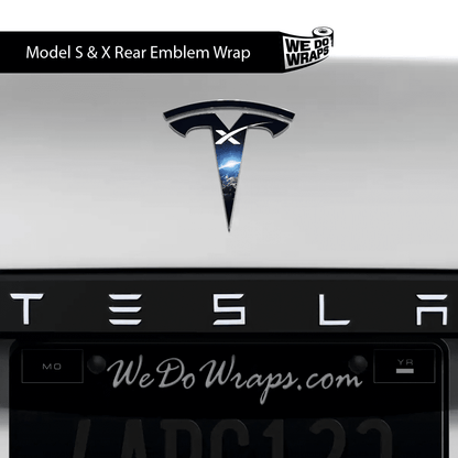 Tesla Model S with SpaceX Tesla emblem decals on front and back, showcasing sleek automotive decal design.