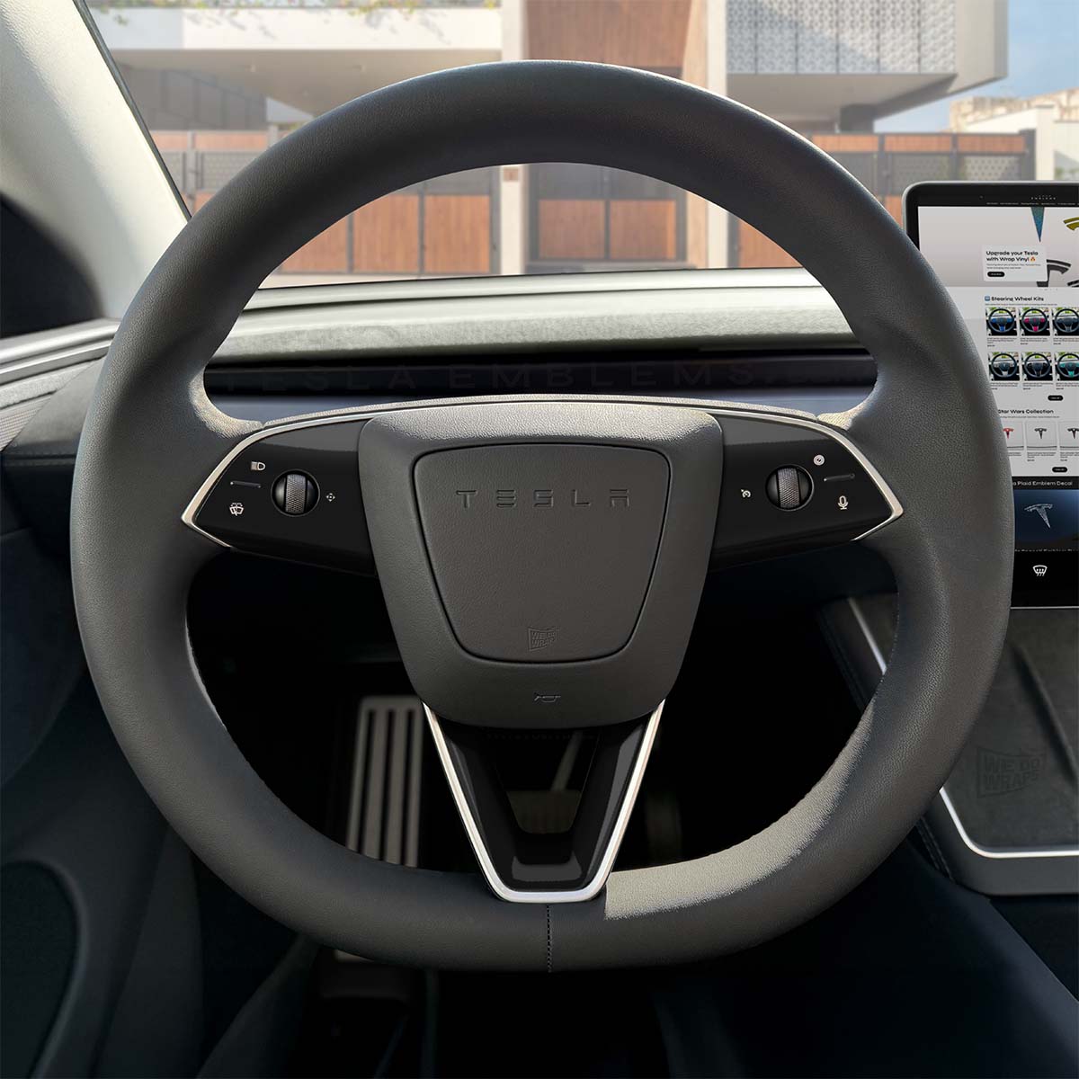 Tesla Emblems 3M Gloss Black steering wheel trim decal kit for Tesla MY 2026+ refresh, includes three decals for vehicle enhancement.