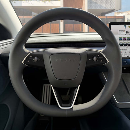 Tesla Emblems 3M Gloss Black steering wheel trim decal kit for Tesla MY 2026+ refresh, includes three decals for vehicle enhancement.