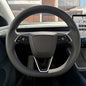 Tesla Emblems 3M Gloss Black steering wheel trim decal kit for Tesla MY 2026+ refresh, includes three decals for vehicle enhancement.