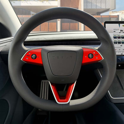 Set of three 3M Gloss Hot Rod Red Tesla steering wheel trim decals for MY 2026+ refresh models, made by Tesla Emblems.
