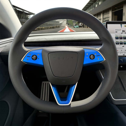 Tesla Model 3 steering wheel trim decal kit in gloss fire blue from 3M, includes three decals for Tesla Emblems.