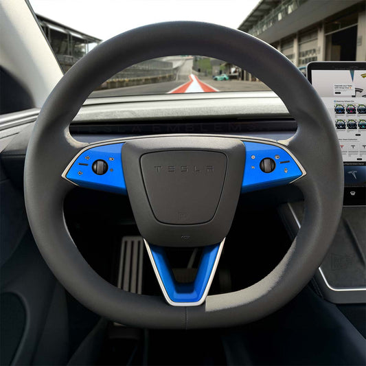 Tesla Model 3 steering wheel trim decal kit in gloss fire blue from 3M, includes three decals for Tesla Emblems.