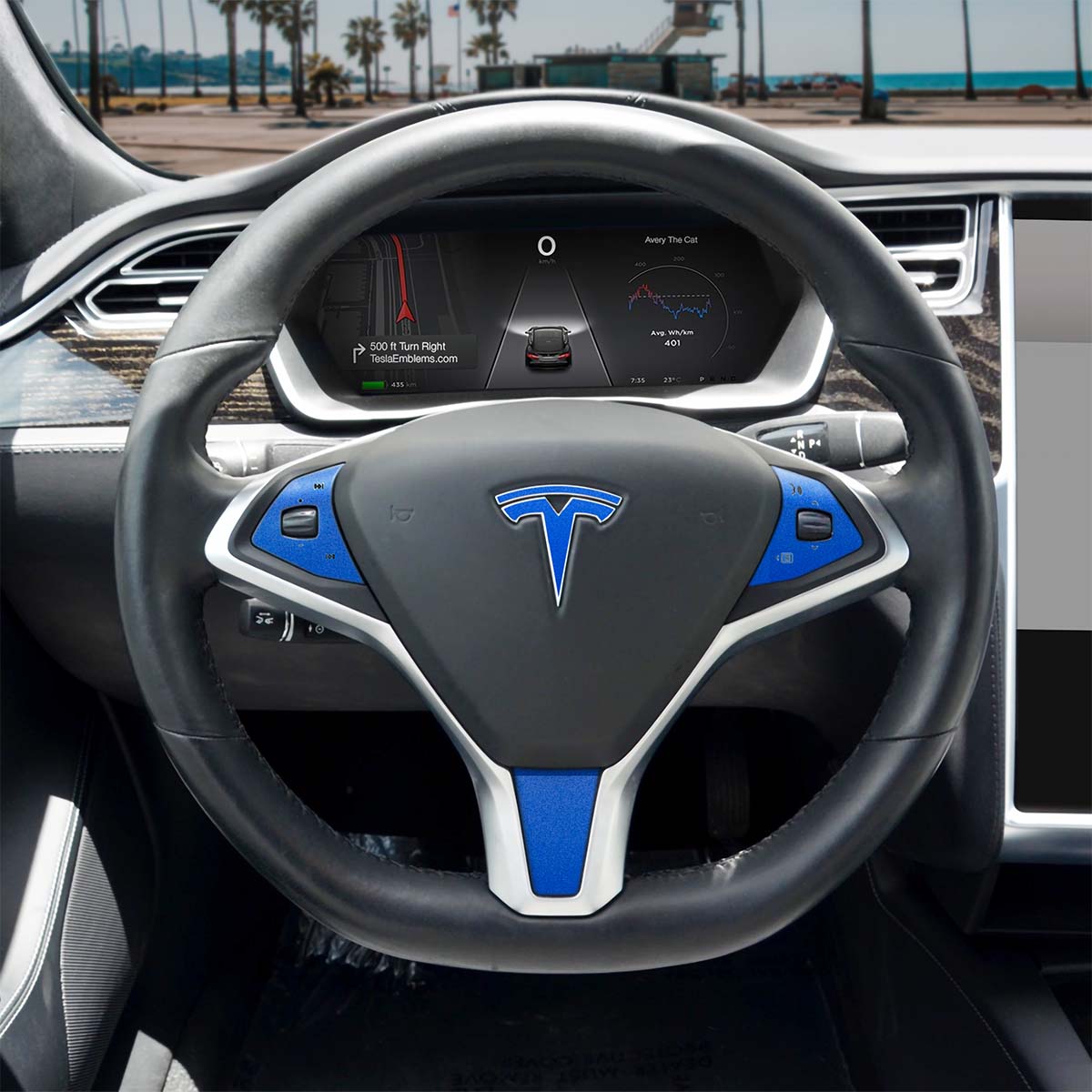 Tesla Model X steering wheel wrap with 3M Gloss Fire Blue decal set from Tesla Emblems, featuring four full trim decals.