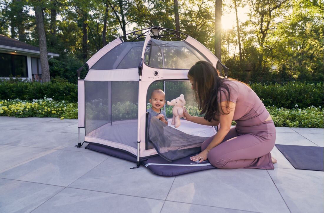 Pop 'N Go® Playpen in cosmic gray by The California Beach Company LLC, showing a portable, foldable playpen with mesh sides.