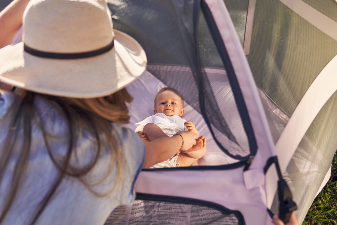 Pop 'N Go Playpen by The California Beach Company LLC in cosmic gray, showing the portable playpen set up for children.