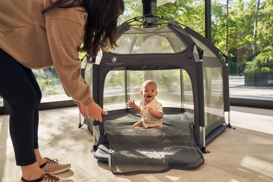 Pop 'N Go Playpen in cosmic gray by The California Beach Company LLC, portable baby playpen with mesh sides and easy setup.