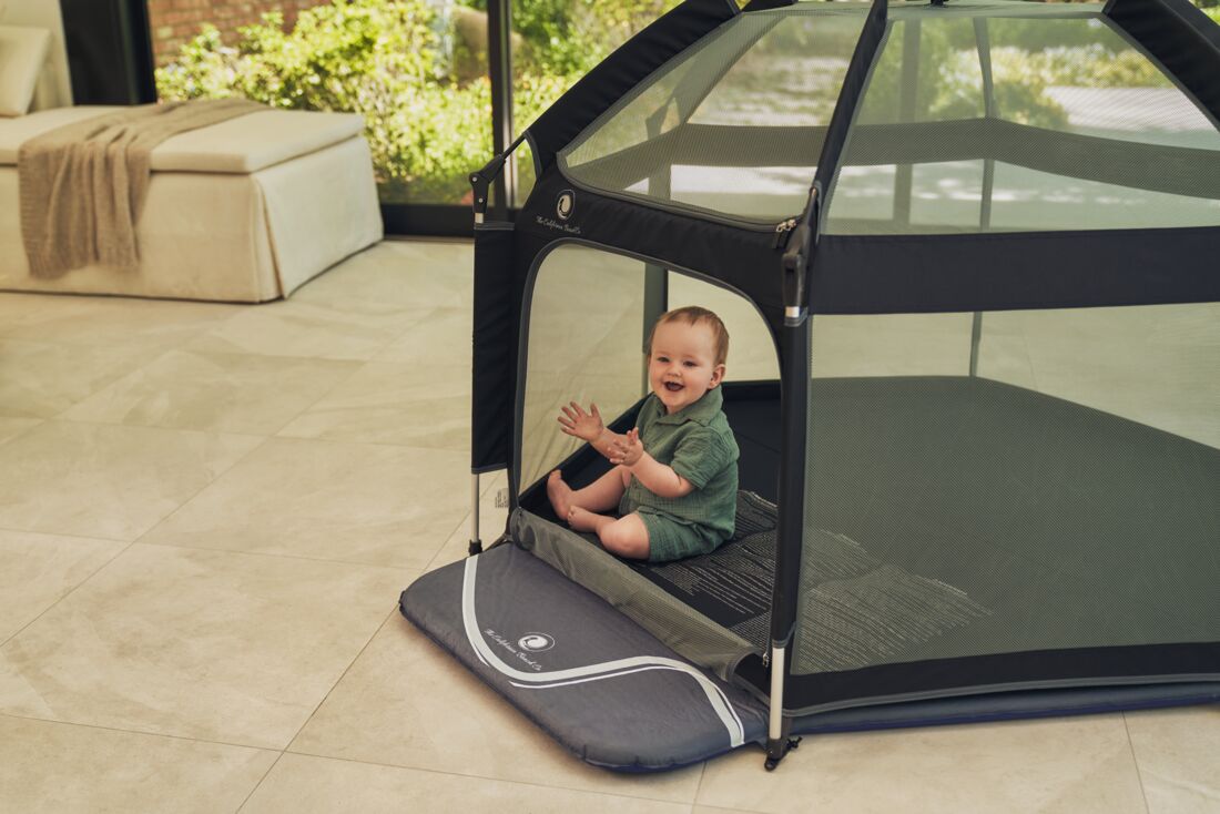 Pop 'N Go Playpen in cosmic gray by The California Beach Company LLC, featuring a portable, foldable play area for babies and toddlers.