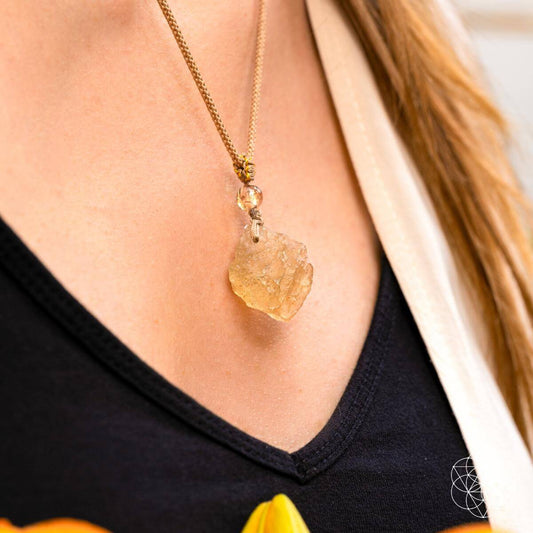 Libyan Desert Glass pendant necklace featuring The Destiny Relic by Conscious Items, showcasing a vibrant, polished desert glass gemstone.
