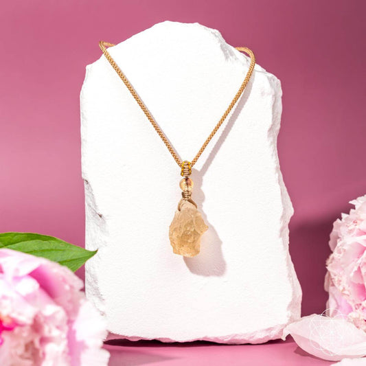 Libyan Desert Glass pendant necklace by Conscious Items featuring the Destiny Relic in a natural, polished stone setting.