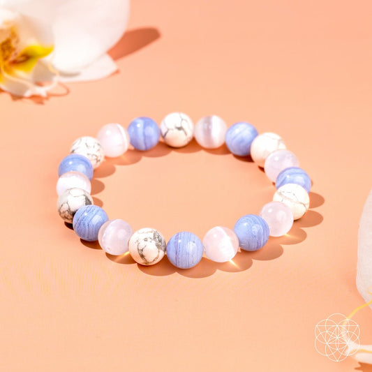 The Empath’s Trio Daily Reset Bracelet by Conscious Items featuring three layered beaded bracelets with natural stones.
