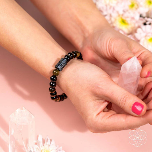 Conscious Items Energy Protection Bracelet featuring black cord and silver accents, designed for spiritual protection and style.